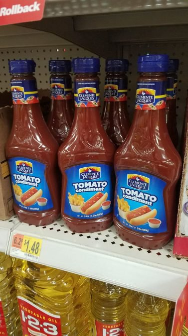 bottles of ketchup labeled tomato condiment