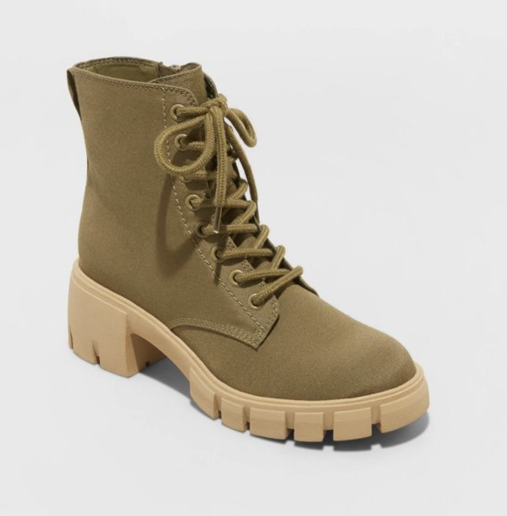 The shoes are shown in the soft olive option with tan chunky soles