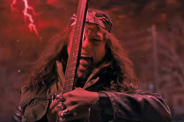 Eddie from Stranger Things playing the guitar