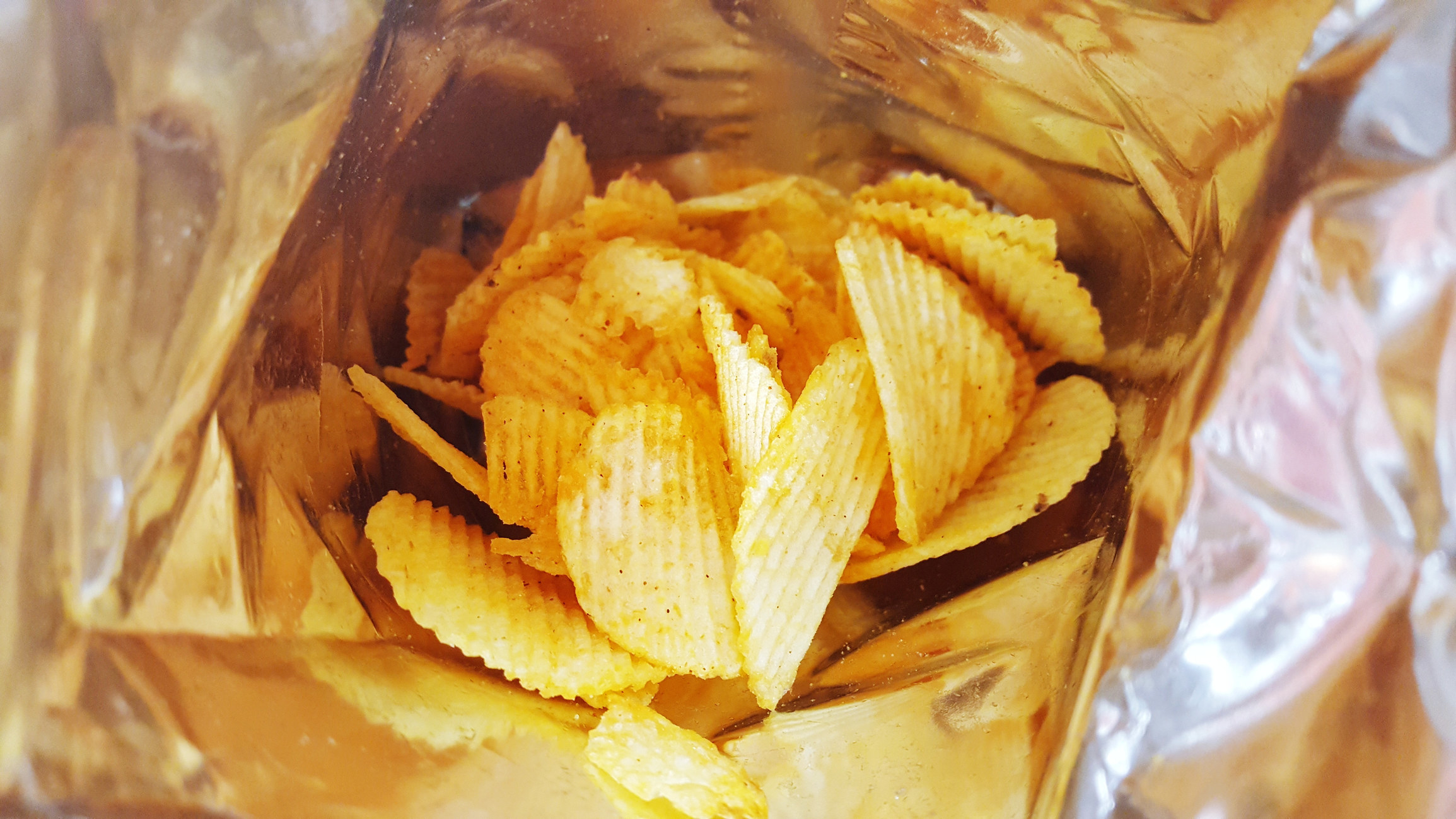 Mostly empty bag of potato chips