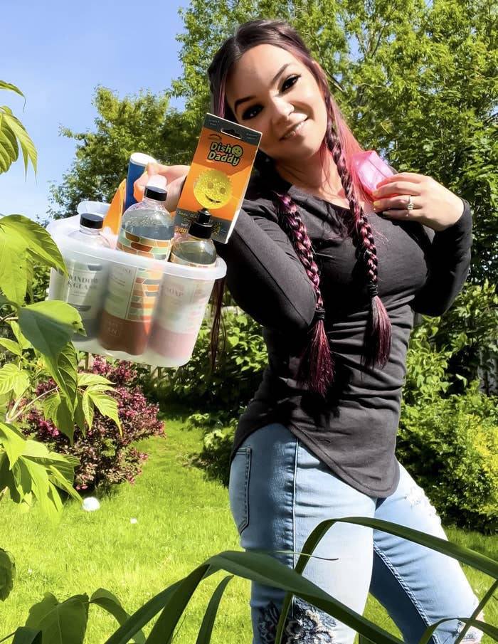 Brogan Ingram showing her cleaning supplies