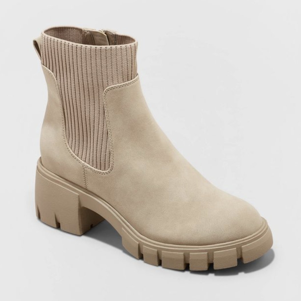 Then light suede shoes have a ribbed sock portion and a chunky heel