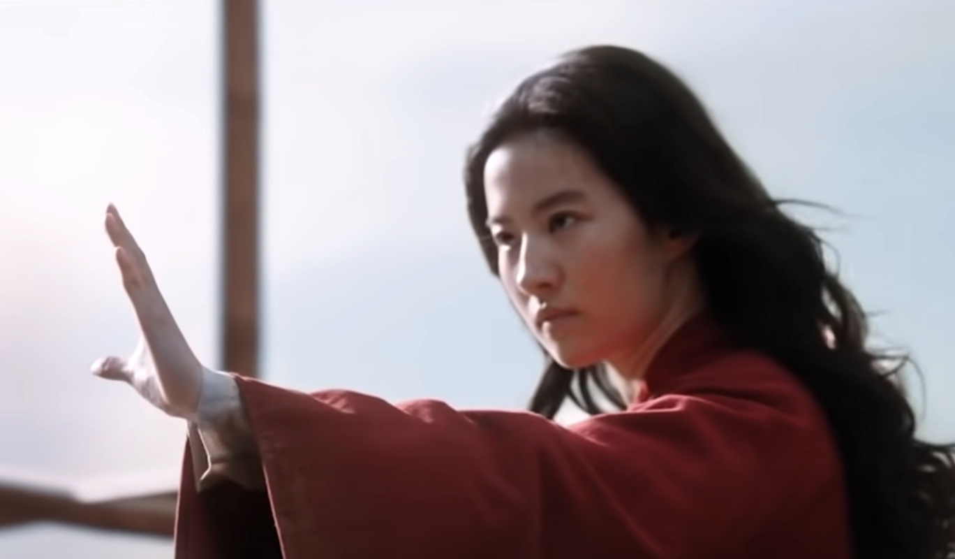 Mulan putting her hand out to fight