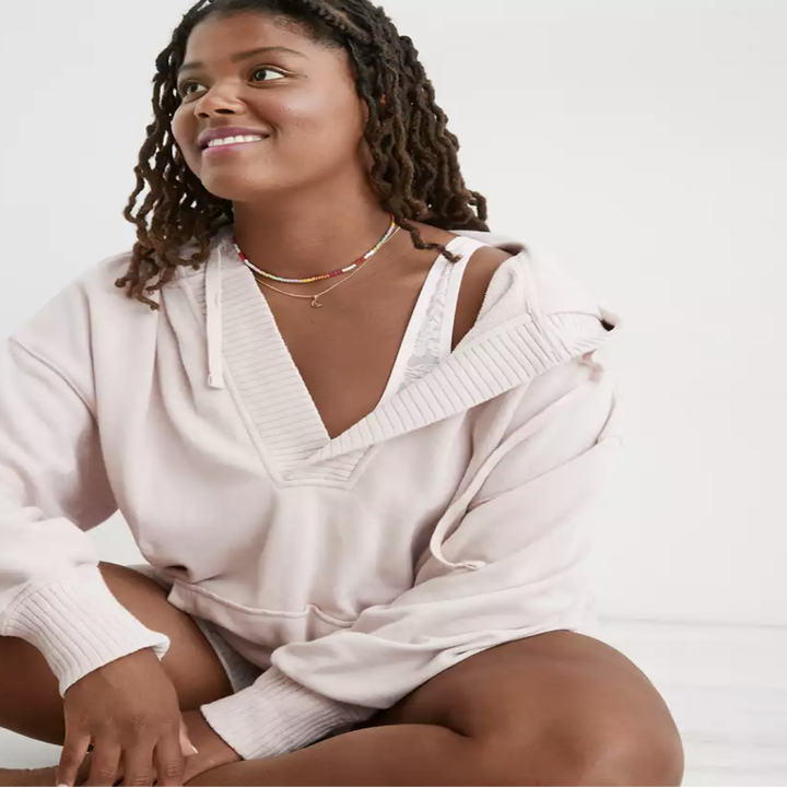 model wearing the cream hoodie