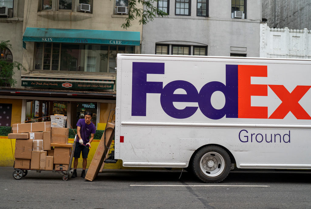 A FedEx truck making deliveries