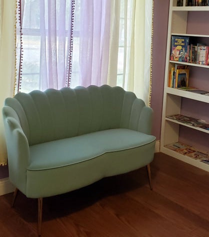 the teal loveseat