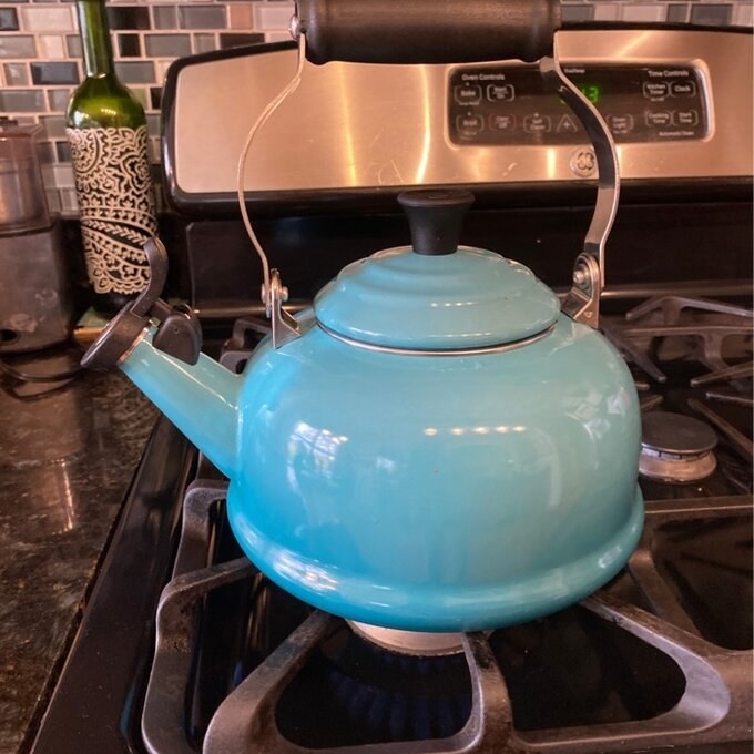 A blue tea kettle