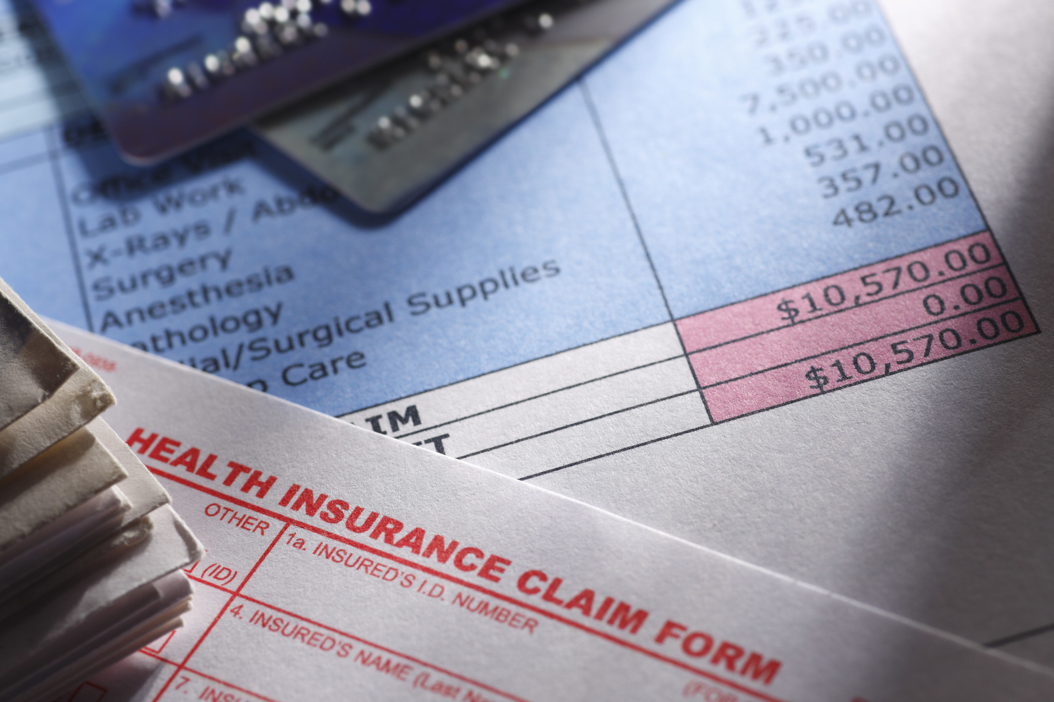 A hospital bill and insurance claim form