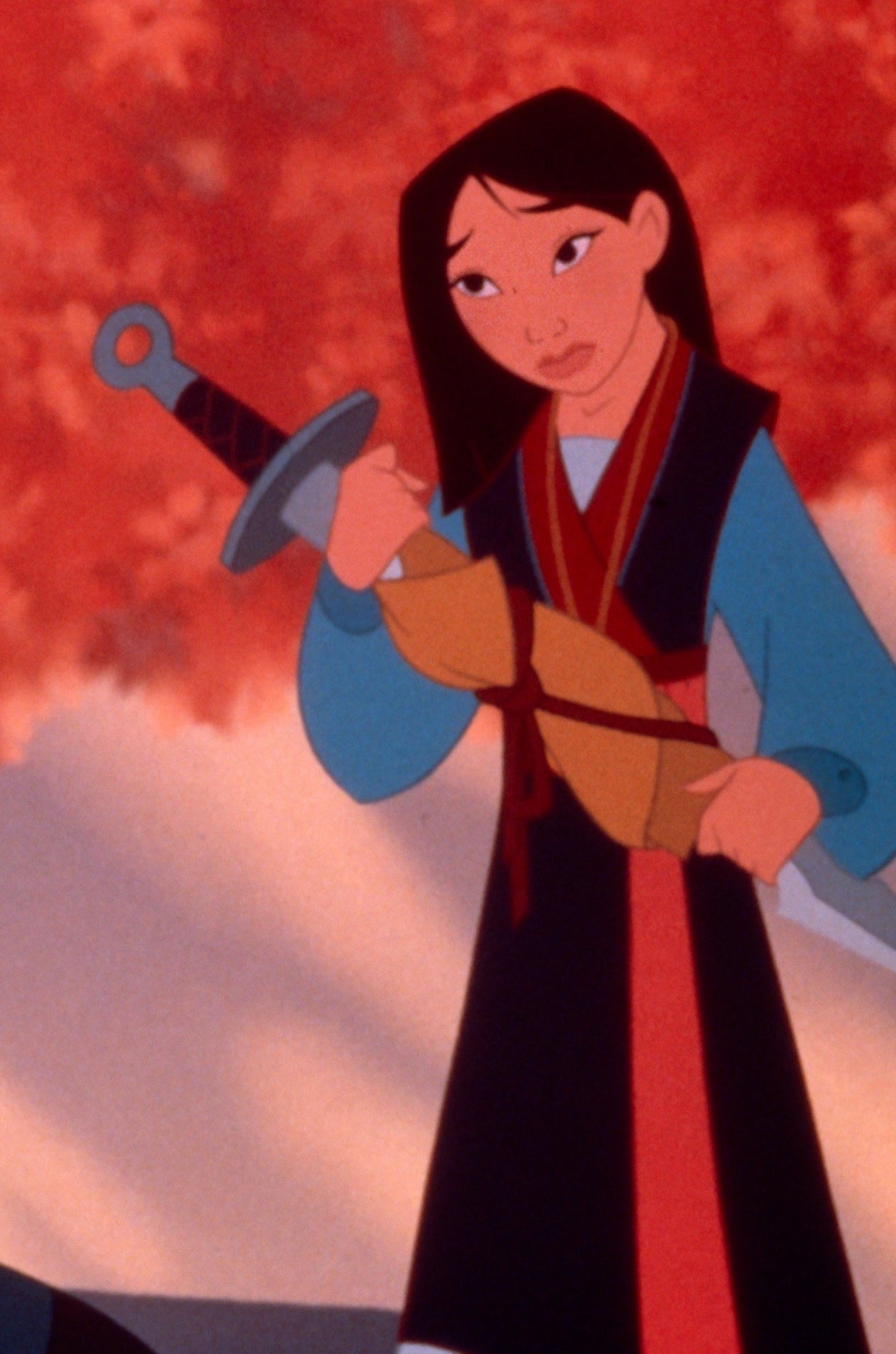 Mulan holding a wrapped up sword