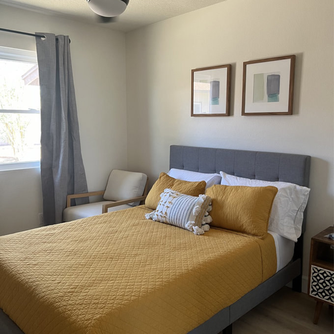 A yellow bedspread in a reviewer&#x27;s home