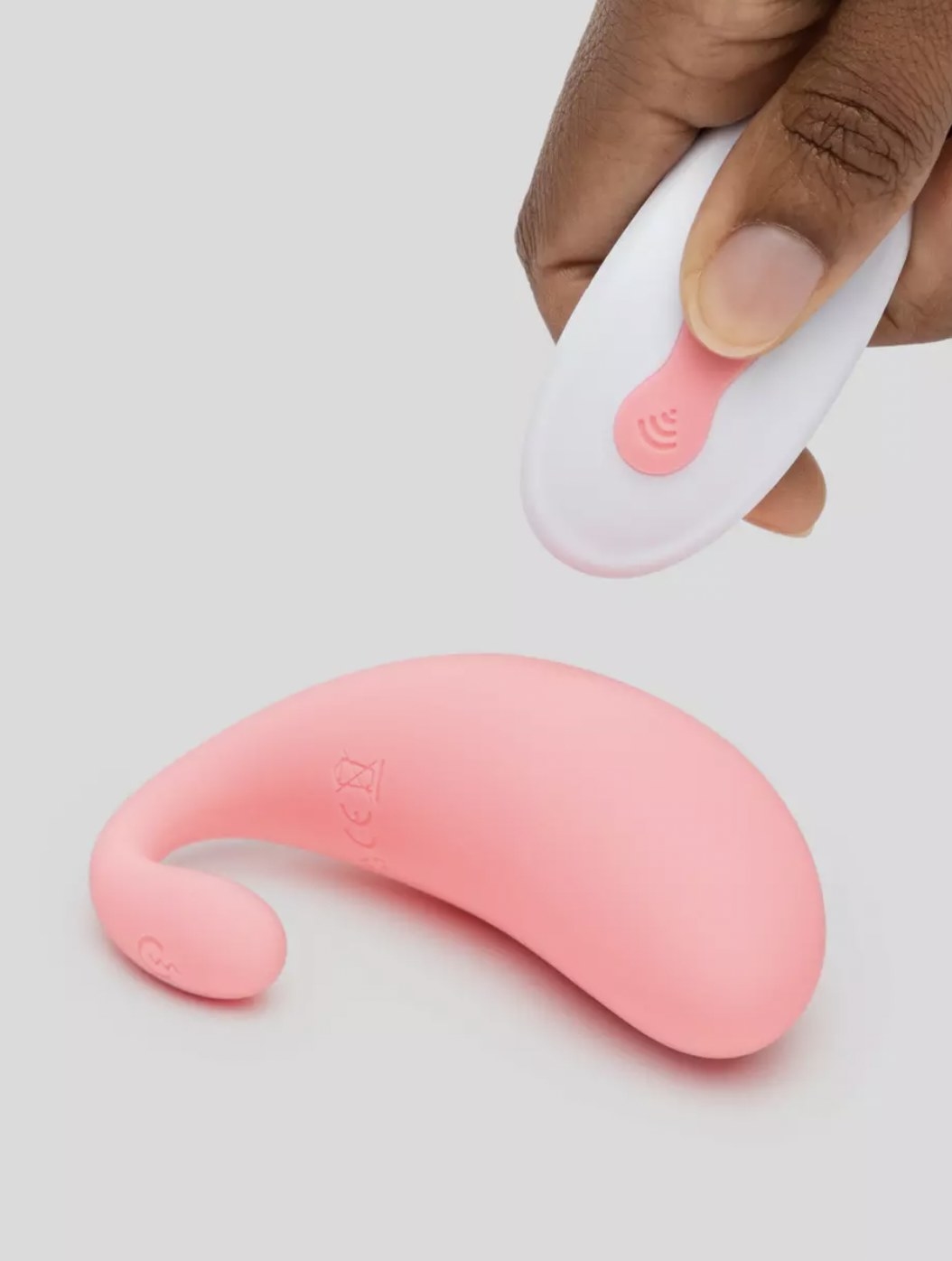 The pink vibrator with someone pressing remote control