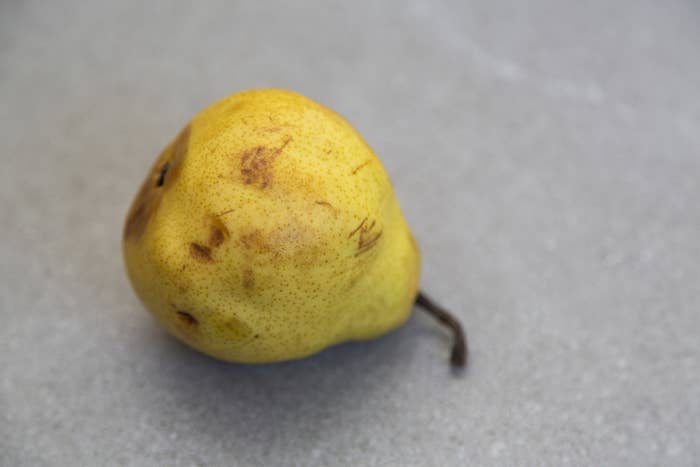 A slightly bruised pear