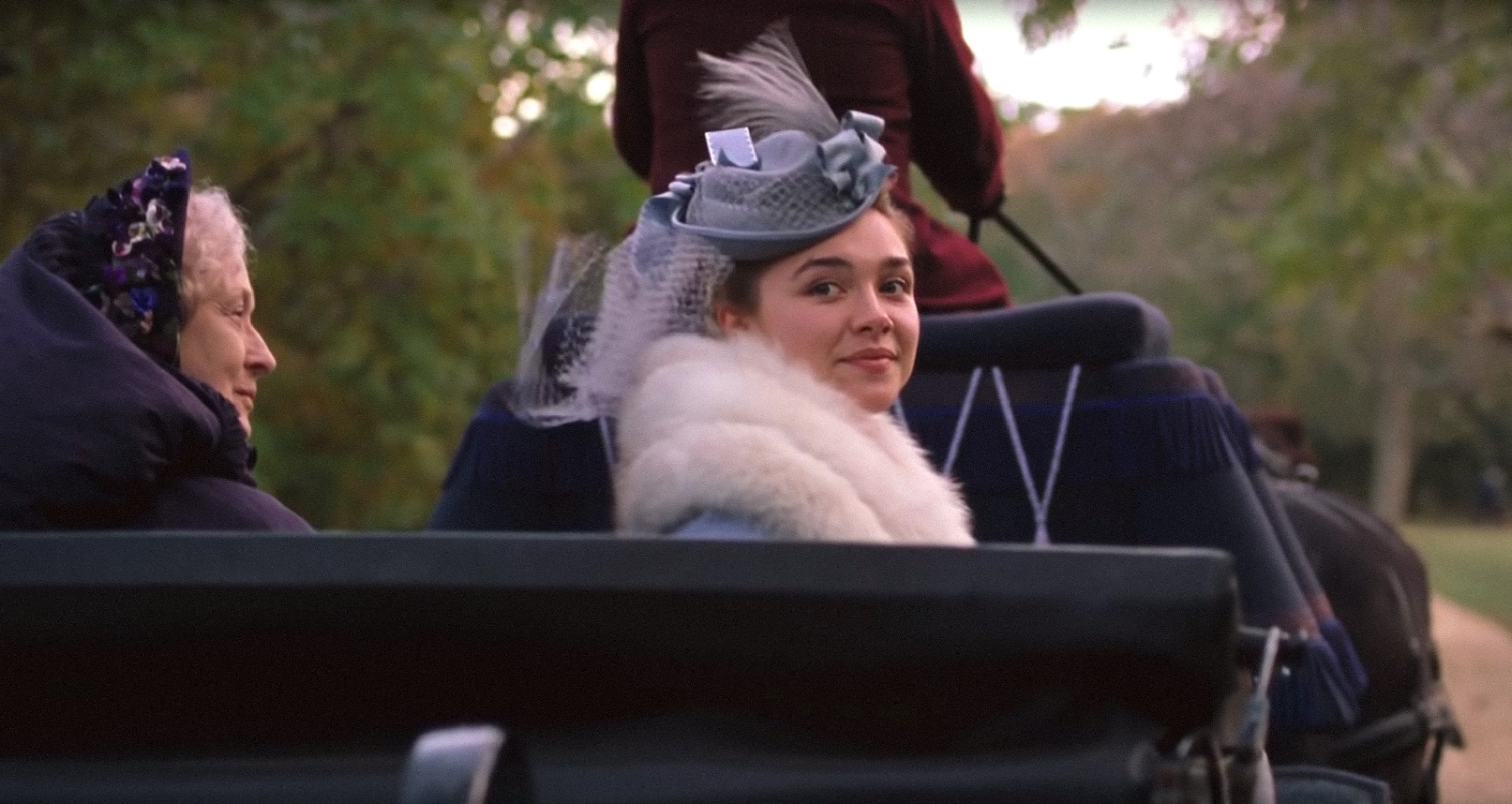 Florence Pugh and Meryl Streep ride in the back of a carriage