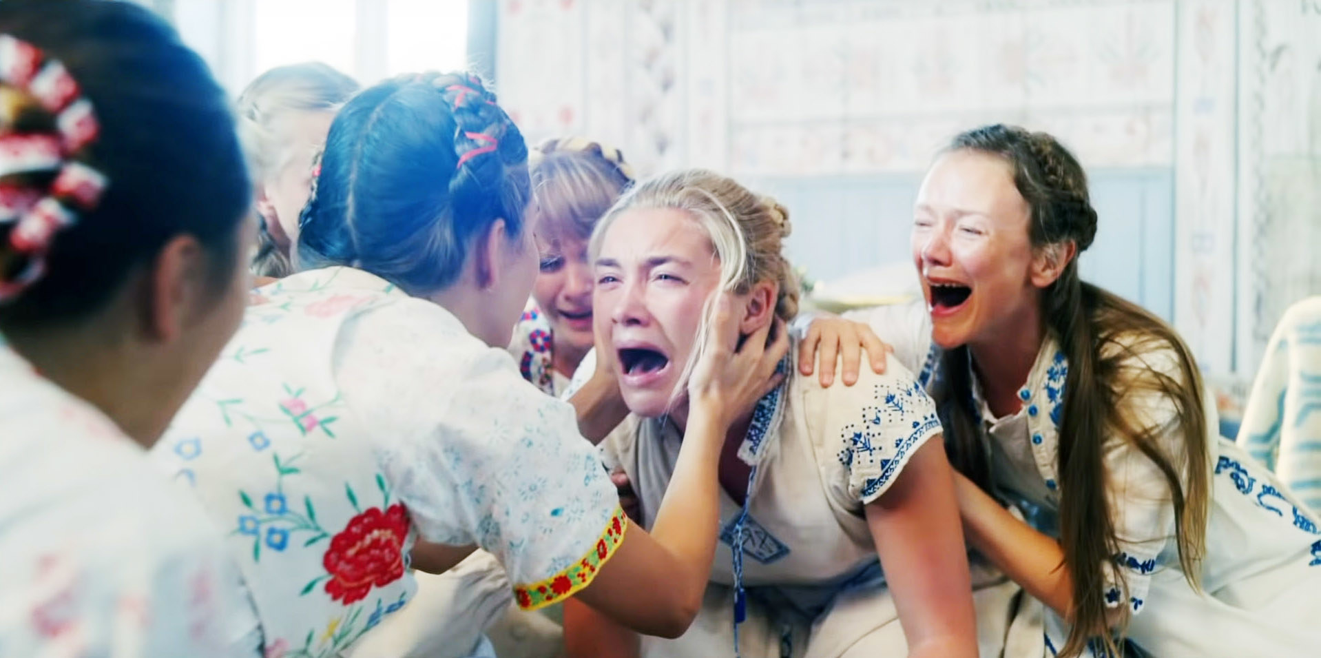 Florence Pugh screams with other women