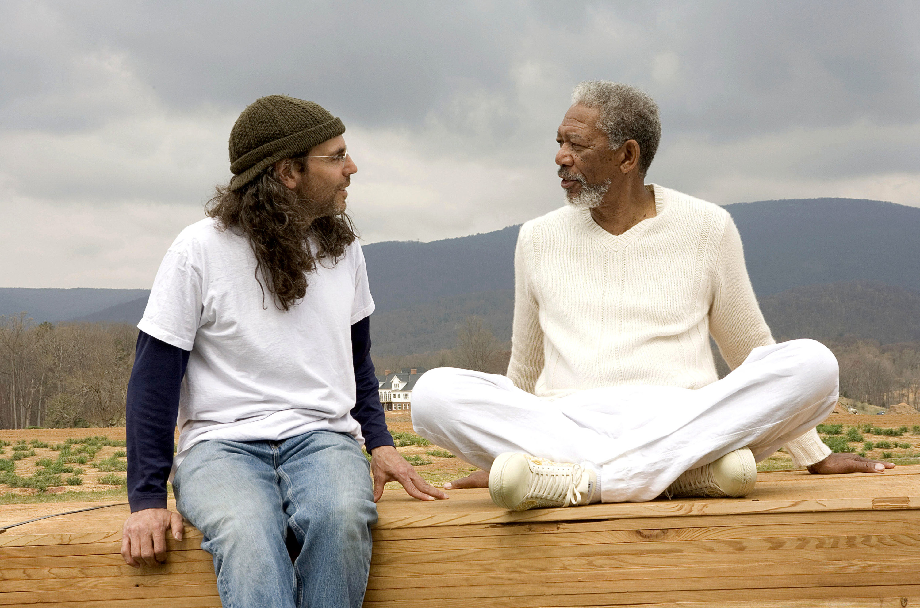 two of the characters sitting outside