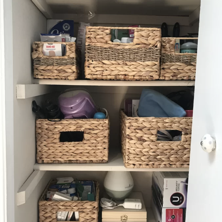 a bunch of baskets in a reviewer's closet