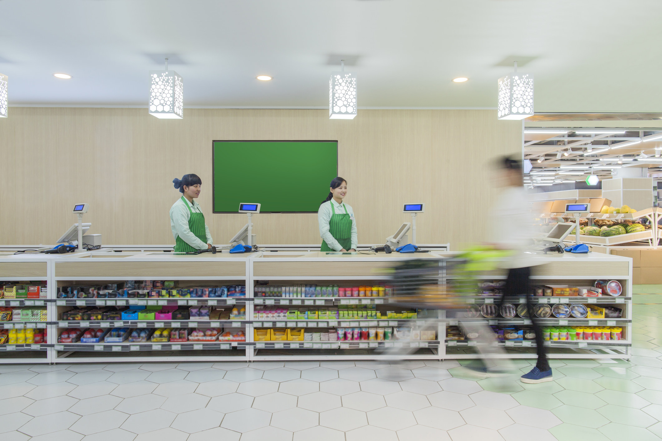 Cashiers awaiting a customer