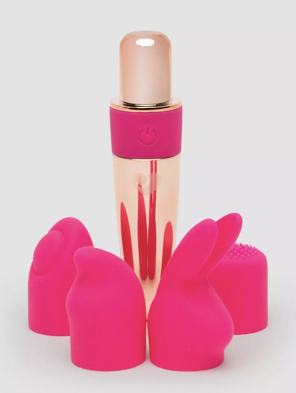 the pink and gold vibrator with four pink tips surrounding base of toy