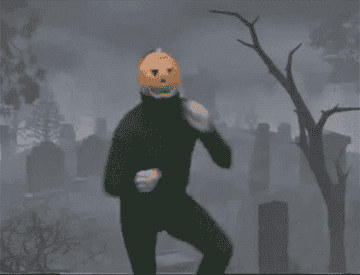 A man dancing with a pumpkin on his head