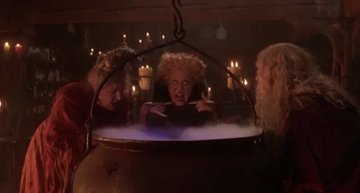 three witches around a cauldron