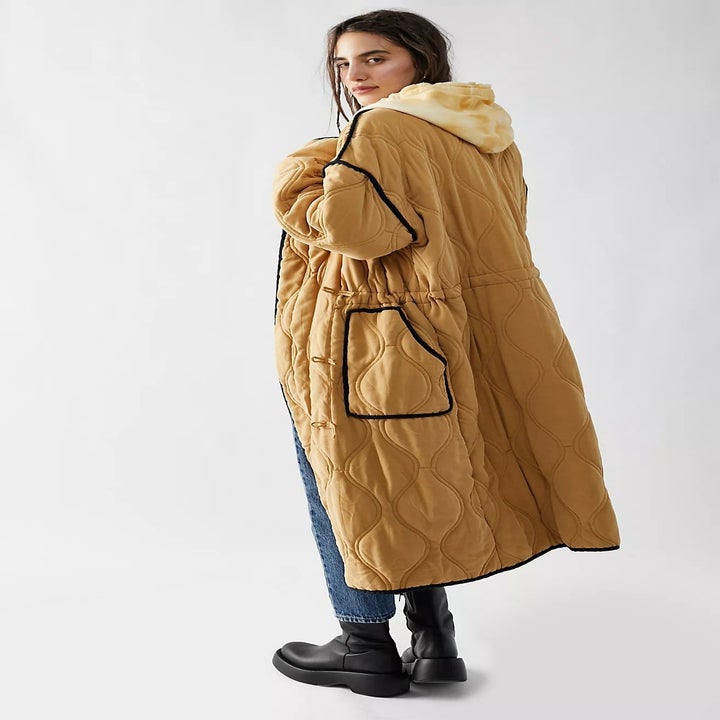 model wearing the coat