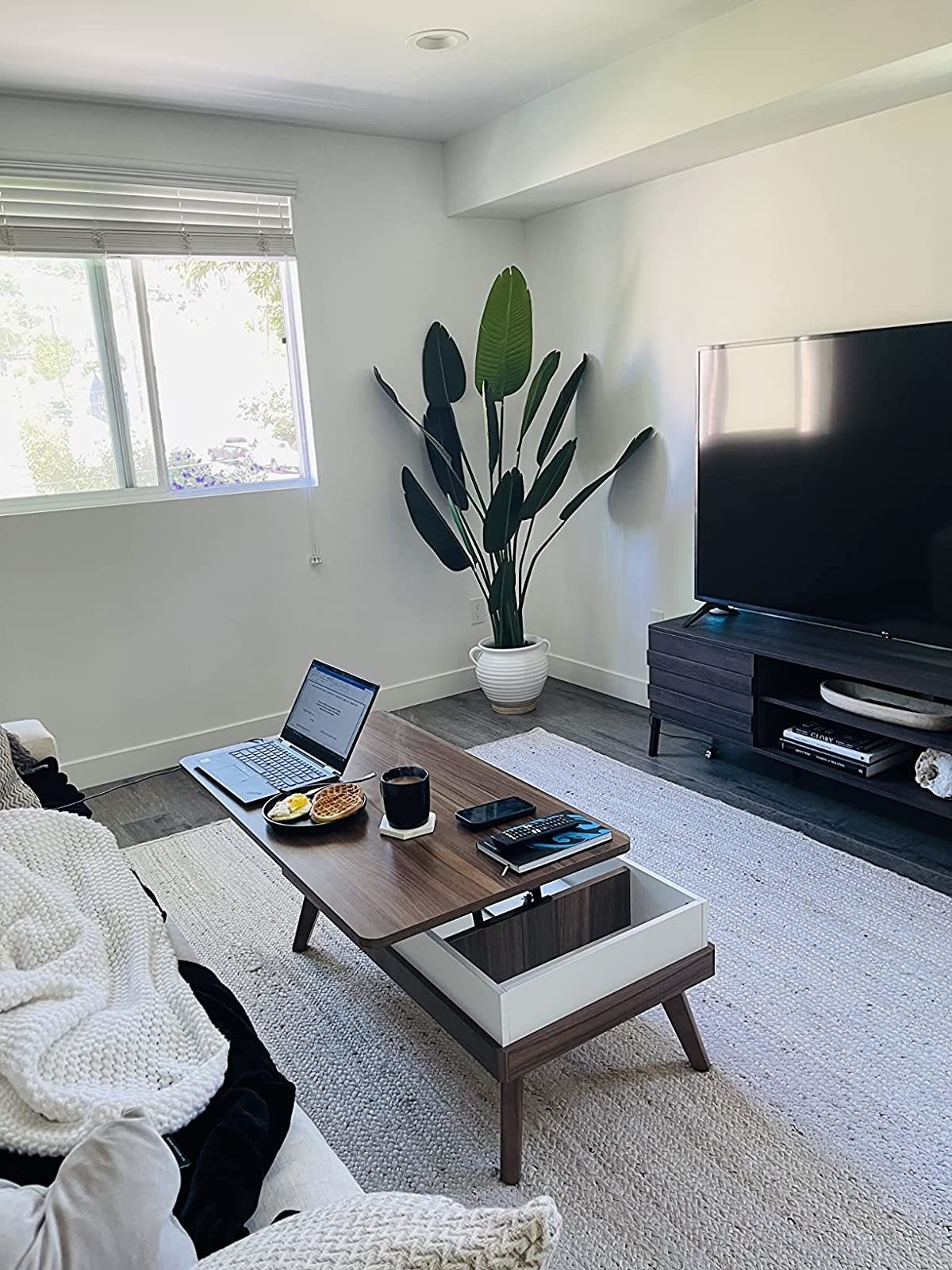 Reviewer image of lift top coffee table in a living room