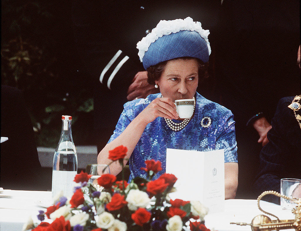 The Queen having tea