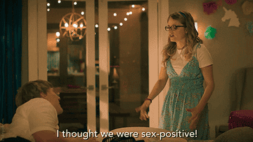A couple talking about sex positivity