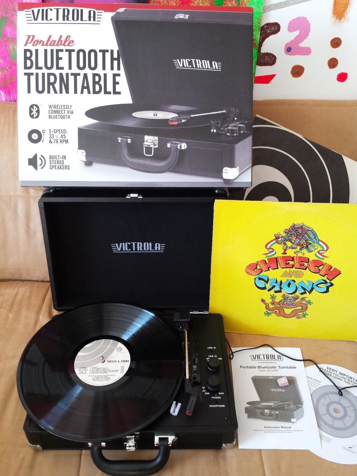 Reviewer photo of the black record player with cheech and chong vinyl set up