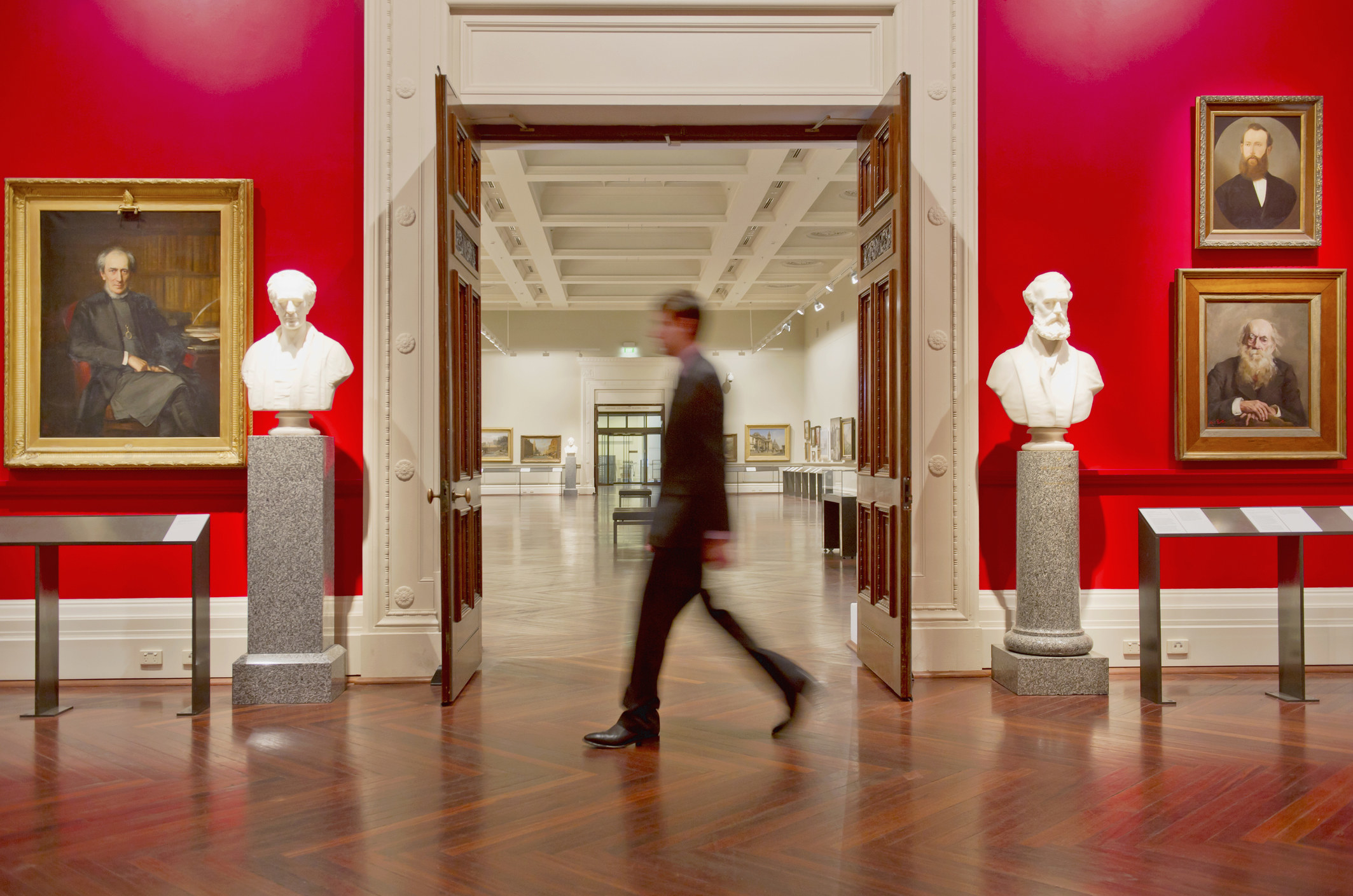 A man walking in a museum