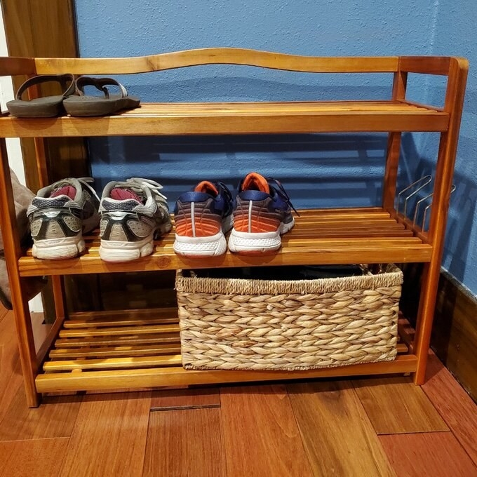 reviewer&#x27;s picture of the wooden shoe basket