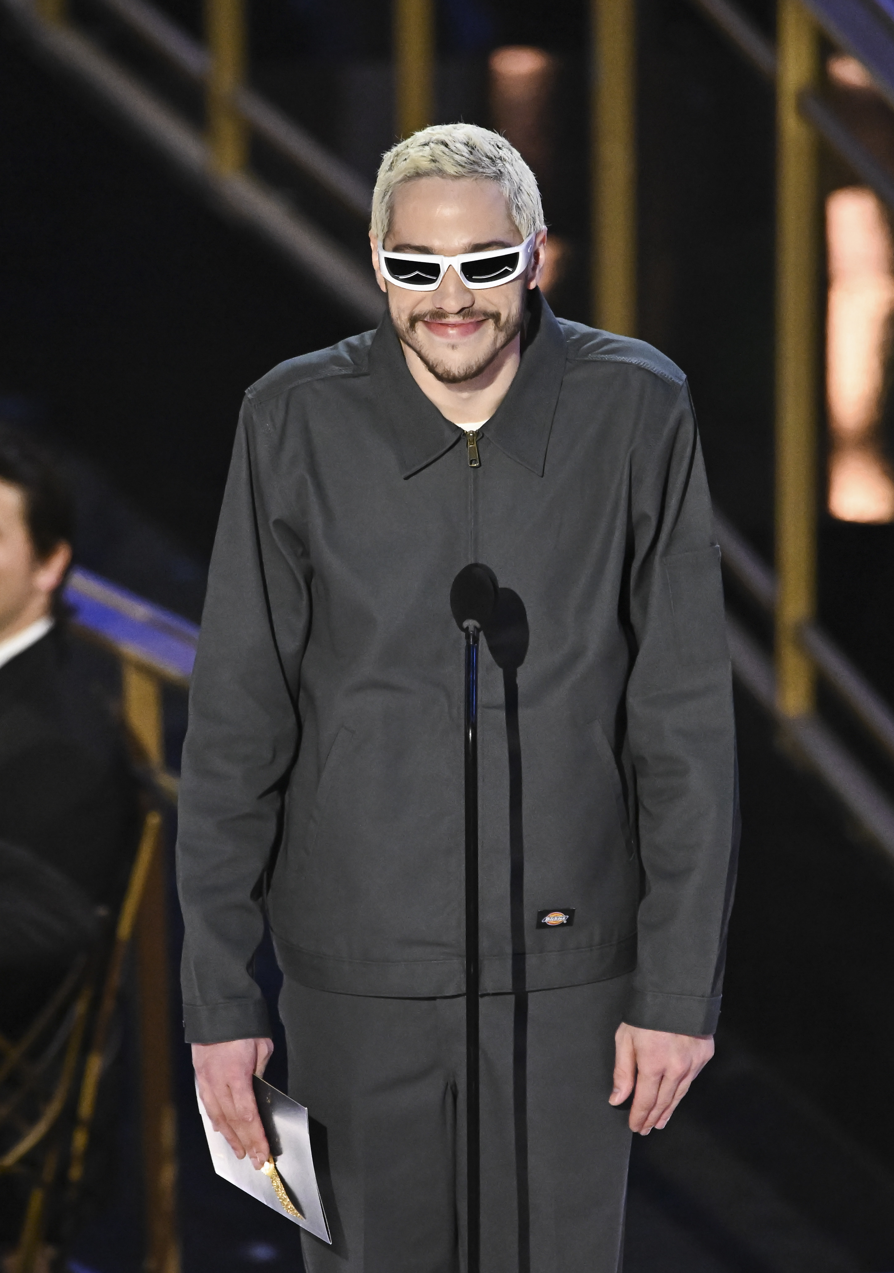 Pete wearing sunglasses and wearing a Ye-type suit