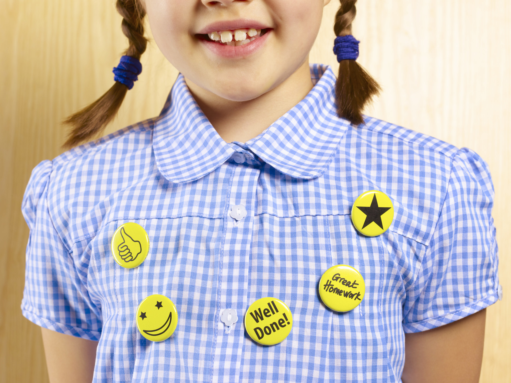 a child wearing positive reinforcement pins