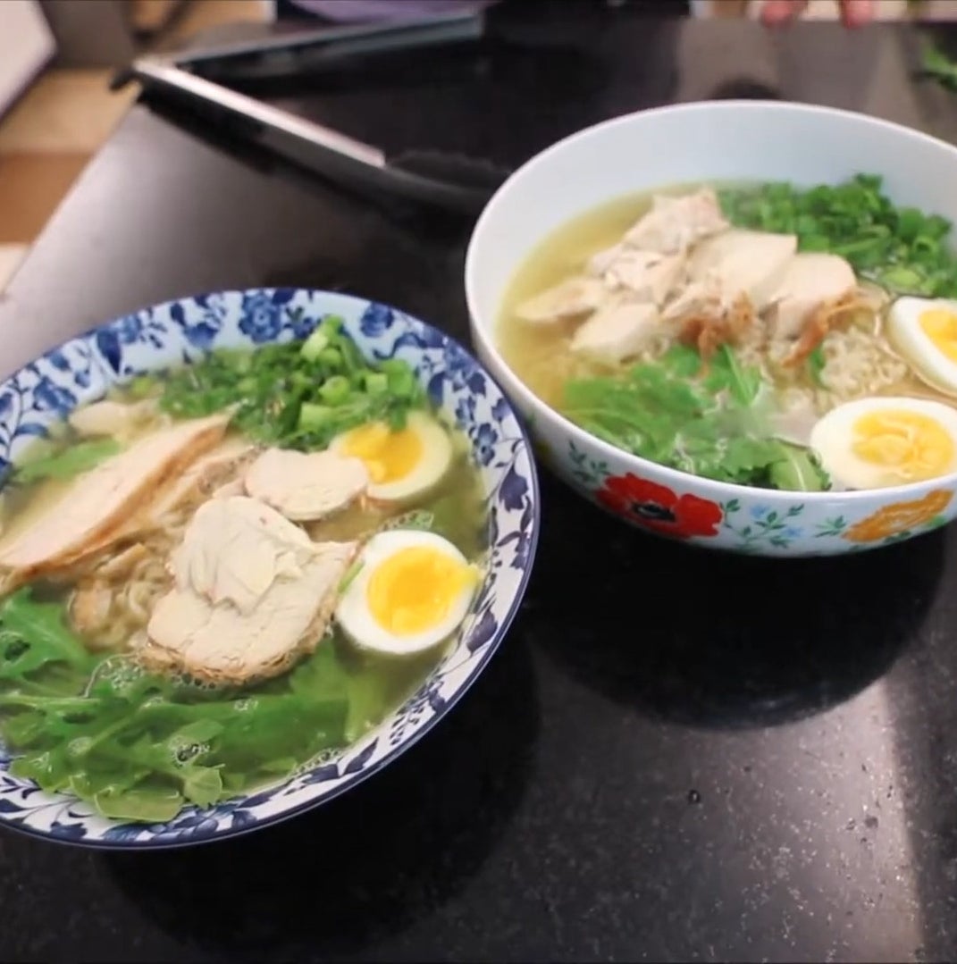 ramen soup in a large bowl with rotisserie chicken