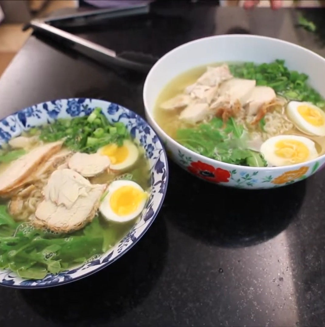 ramen soup in a large bowl with rotisserie chicken