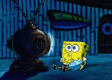 a gif of Spongebob in front of TV, mesmerized and eating popcorn