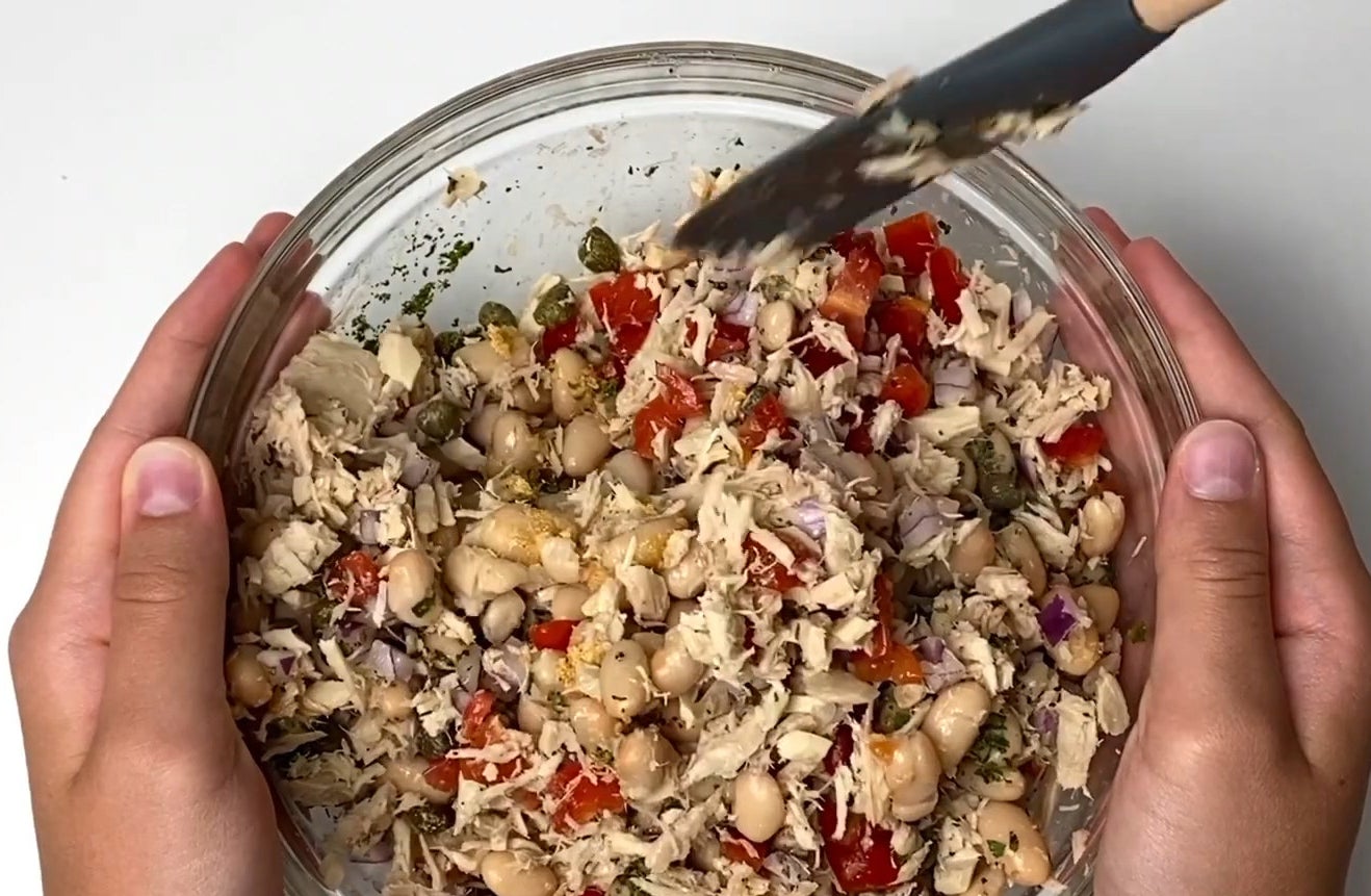 Bean salad with tuna, red onion, and seasoning