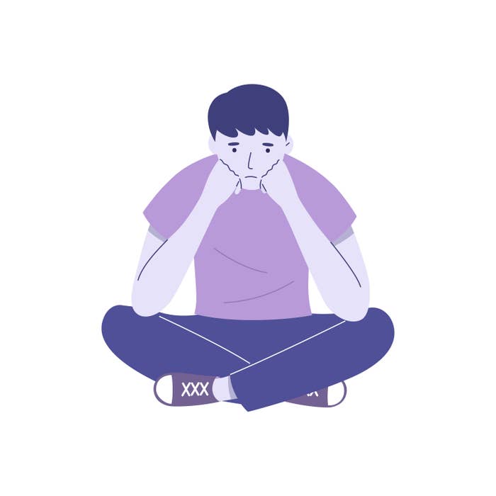Illustration of an unhappy young person sitting cross-legged, with white background