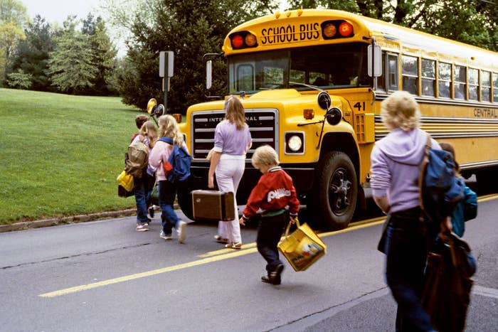 Kids getting on the school bus