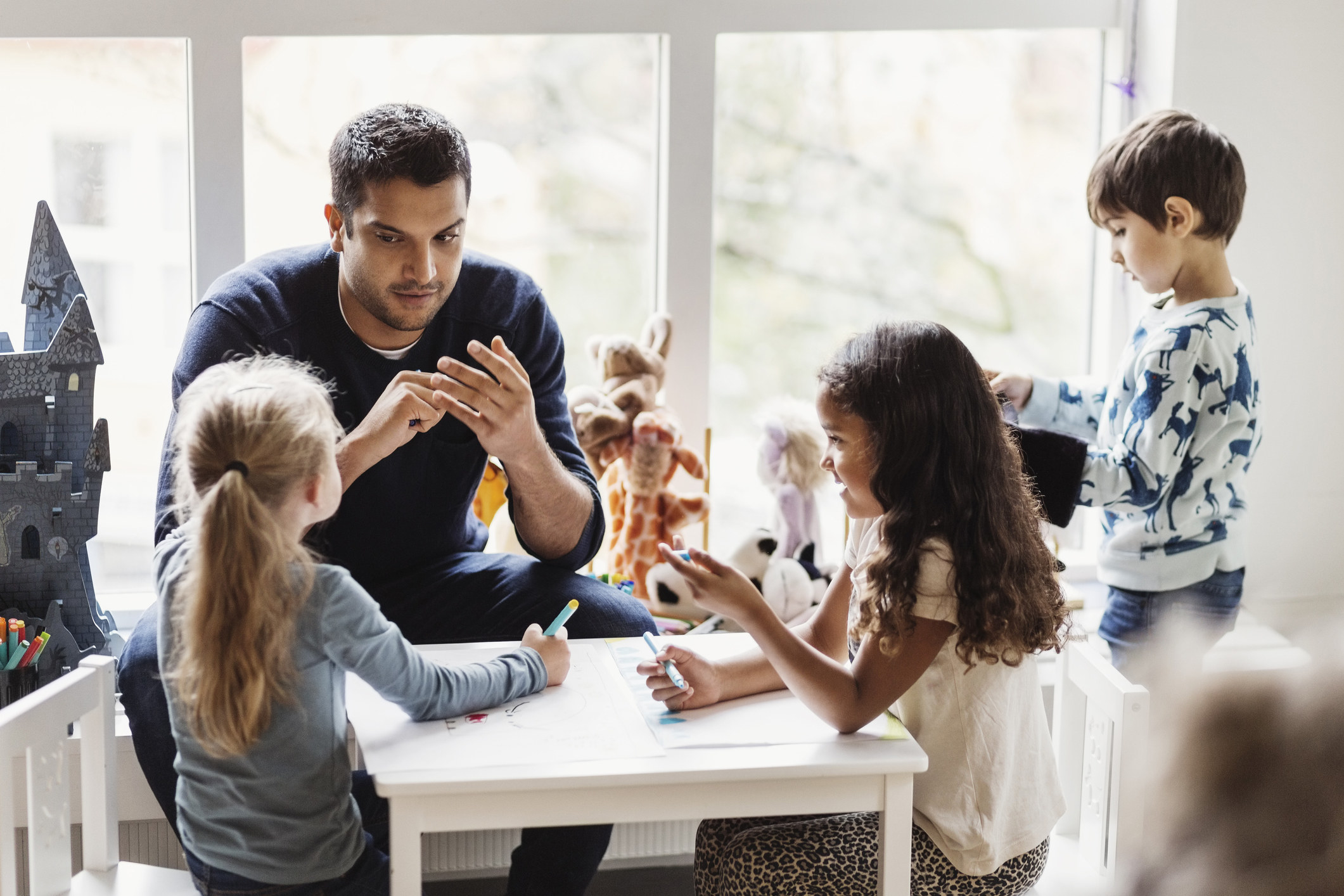 a teacher working with young children