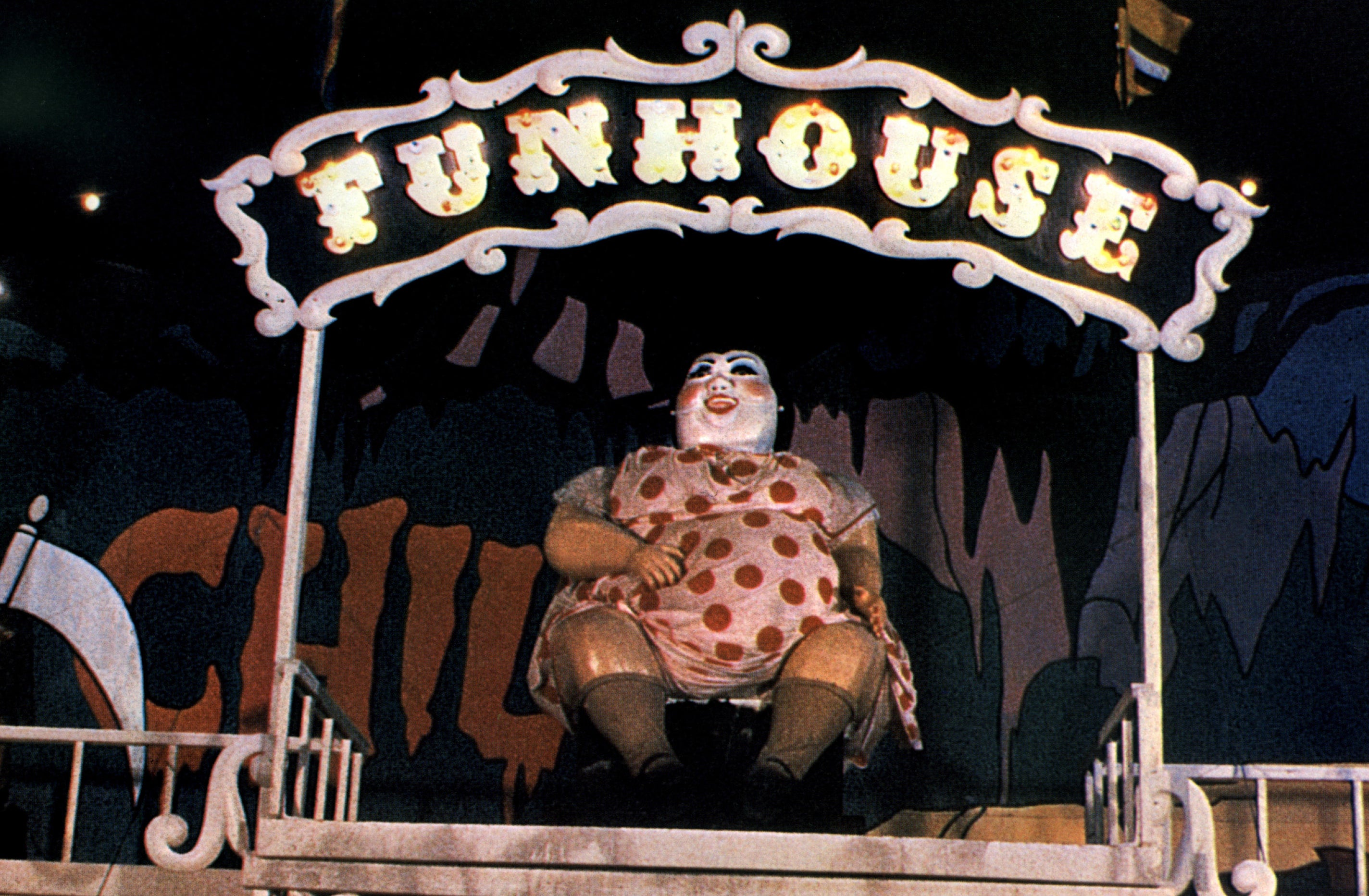 A disturbing clown-like statue adorns the entrance to &quot;The Funhouse&quot;