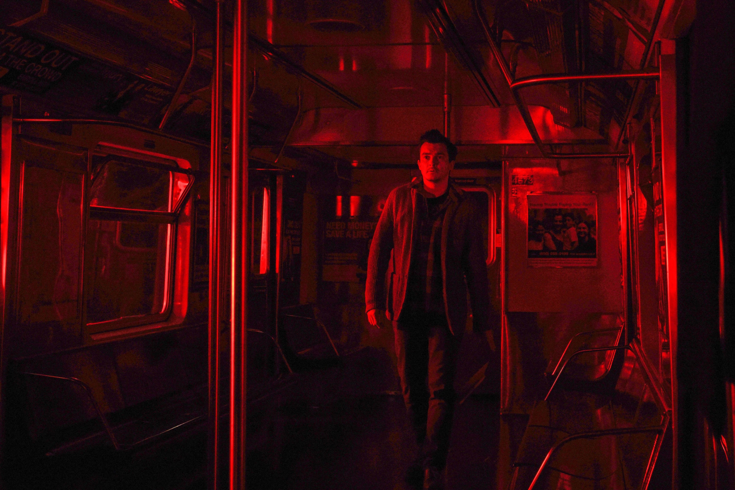 Rupert Friend experiences a red-soaked nightmare aboard a subway car in &quot;Separation&quot;