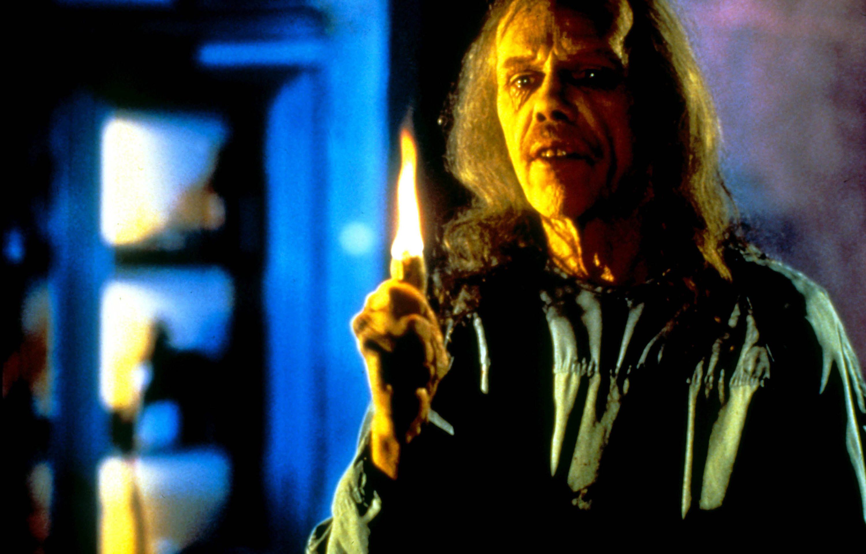 Filmmaker John Carpenter moonlights as a morose mortician with a flaming thumb in &quot;Body Bags&quot;