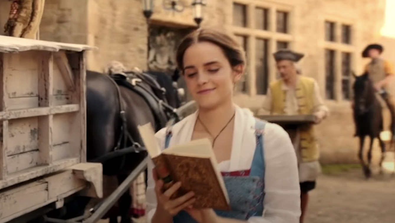 Emma Watson as Belle reading
