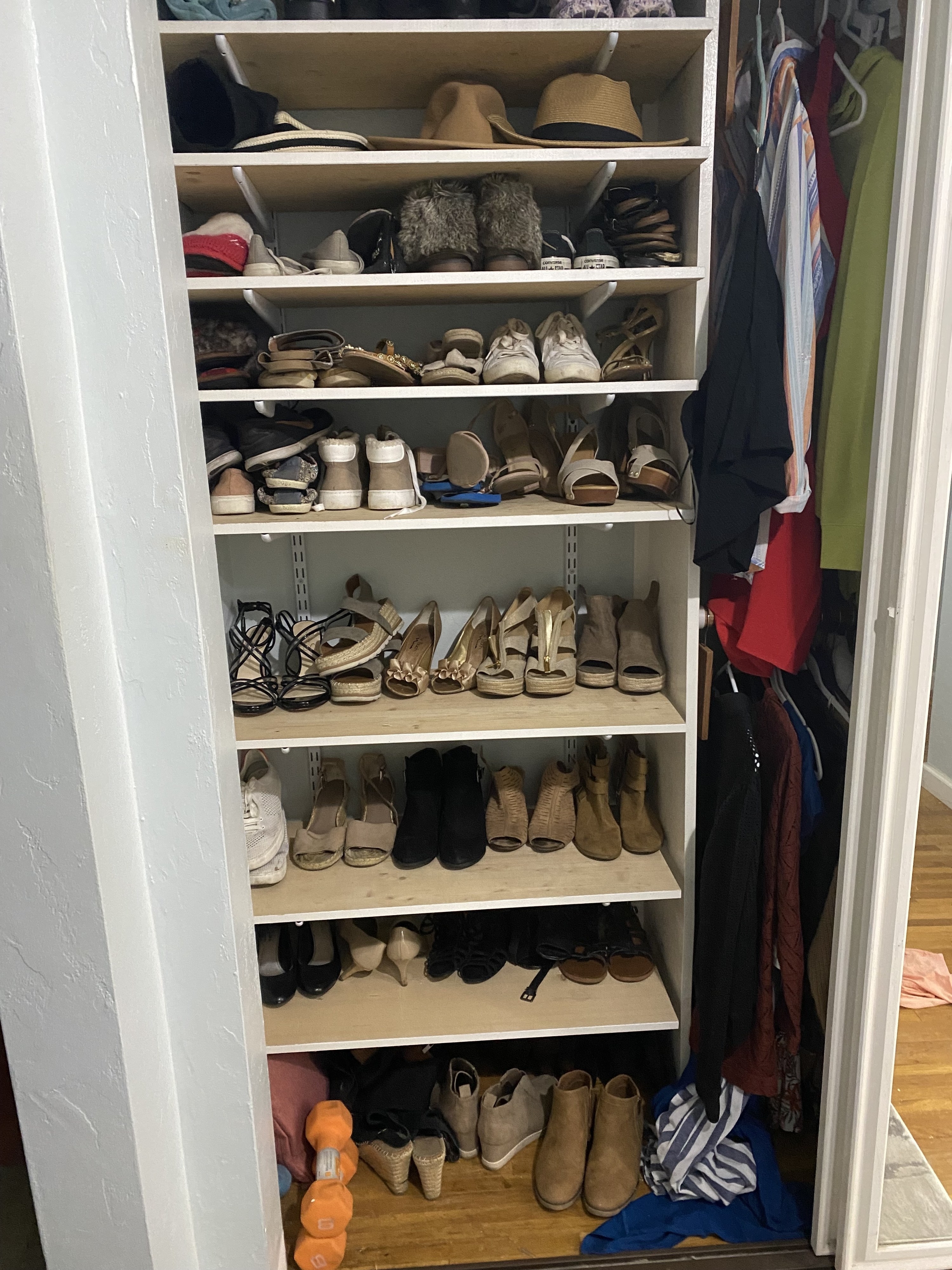 Closet with rows of shoes
