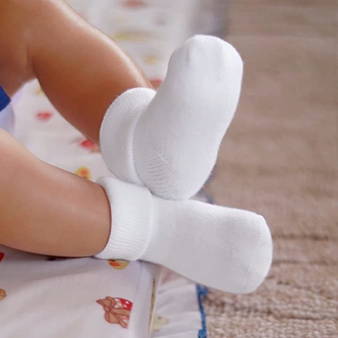 baby feet wearing fresh socks