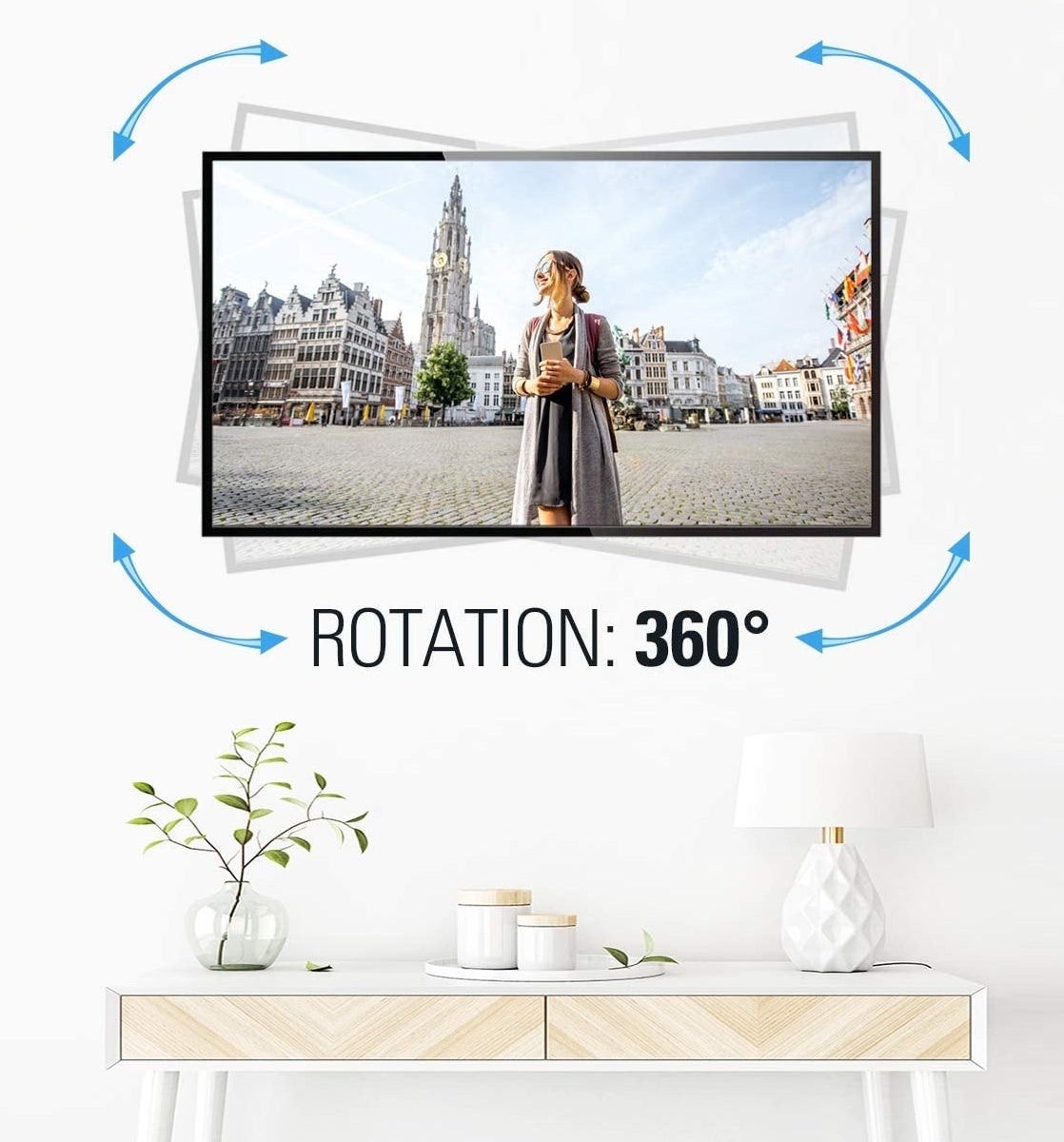 a tv on a wall with arrows showing it can be rotated 360 degrees