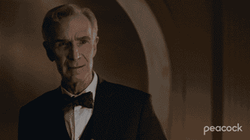 gif of Bill nye the science guy wearing a tux giving a thumbs up
