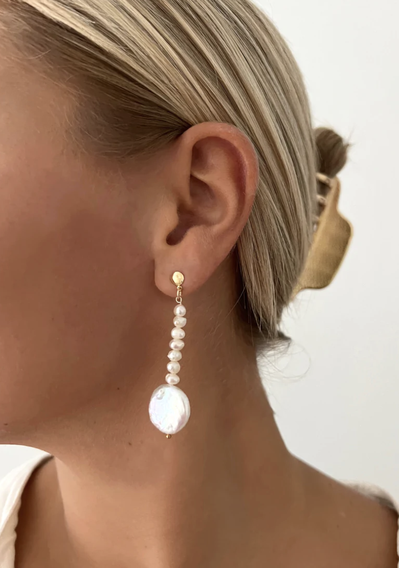 model wearing heidi pearl drop earring