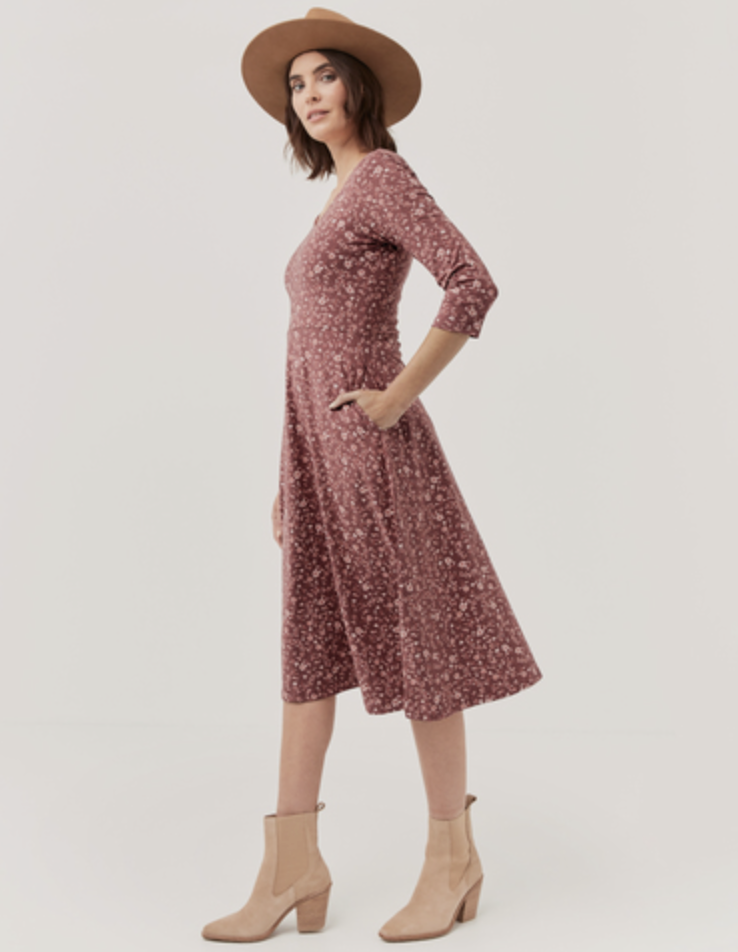 model wearing fit &amp;amp; flare midi party dress